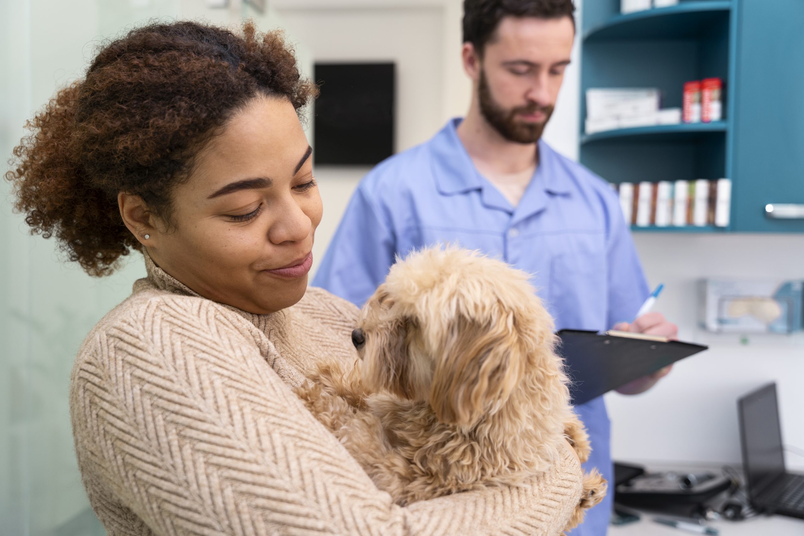 medium-shot-owner-holding-dog